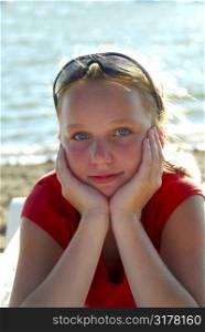 Portrait of a beautiful young girl on a beach