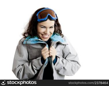 Portrait of a beautiful young girl wearing a winter coat and snow glasses 