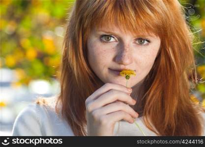 portrait of a beautiful young redhead teenager woman