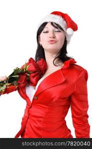 Portrait of a beautiful young woman in a red suit and hat of Santa Claus with red roses on the white background