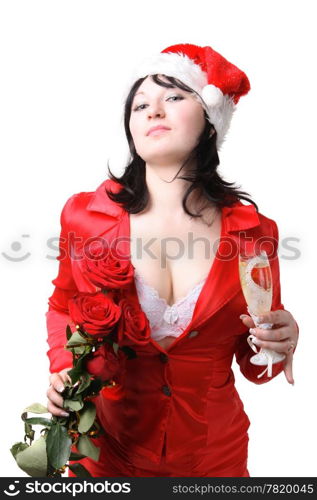 Portrait of a beautiful young woman in a red suit and hat of Santa Claus with red roses and champagne on the white background