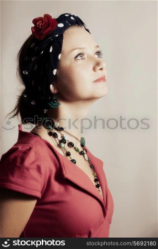 Portrait of a beautiful young woman in headscarf
