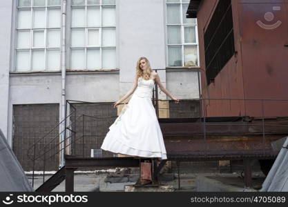 Portrait of a beautiful young woman in the image of the bride