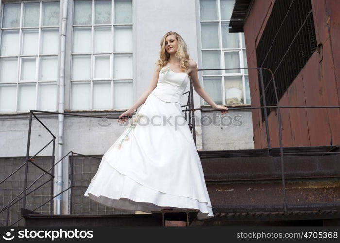 Portrait of a beautiful young woman in the image of the bride