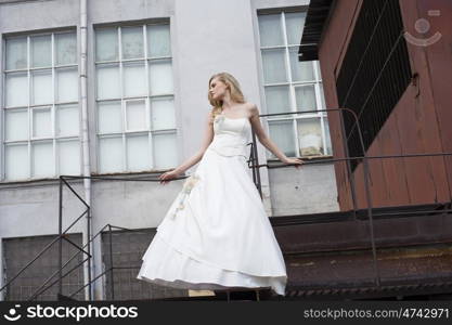 Portrait of a beautiful young woman in the image of the bride