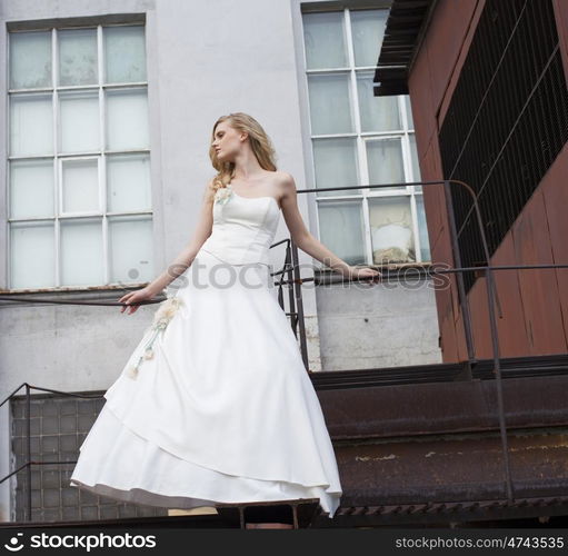 Portrait of a beautiful young woman in the image of the bride