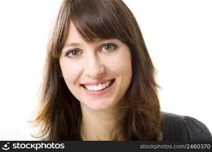 Portrait of a beautiful young woman looking at the camera and smiling, isolated on a white background