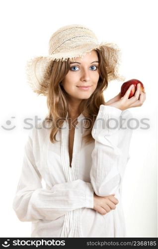 Portrait of a beautiful young woman with a red healthy apple