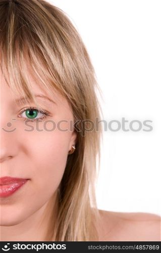 Portrait of a beautiful young woman with green eye. Half face portrait