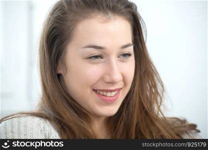 portrait of a beautiful young woman with long hair
