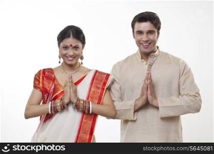 Portrait of a Bengali couple greeting