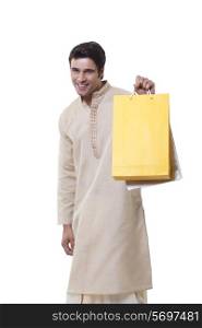 Portrait of a Bengali man holding shopping bags