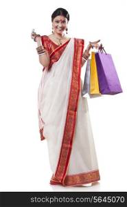 Portrait of a Bengali woman with shopping bags
