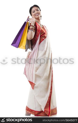 Portrait of a Bengali woman with shopping bags