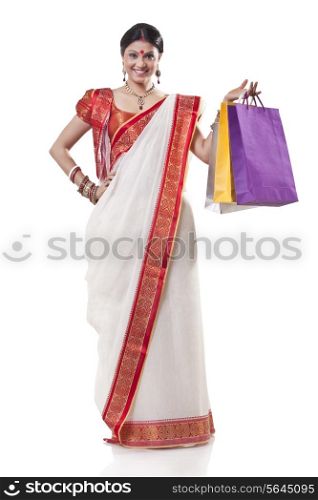 Portrait of a Bengali woman with shopping bags