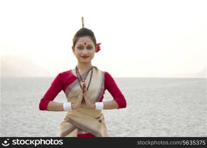 Portrait of a Bihu dancer greeting