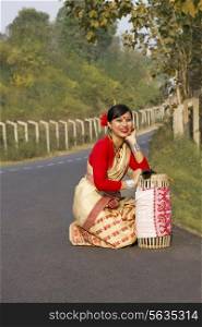Portrait of a Bihu dancer with a dhol