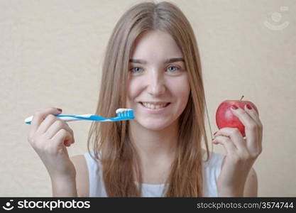 Portrait Of A Blond Woman Brushing Her Teeth