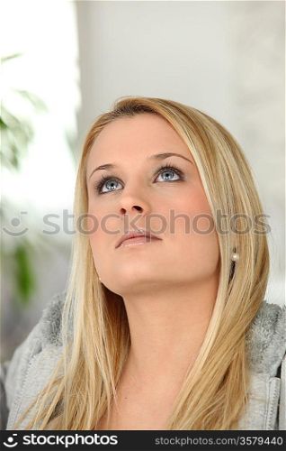 Portrait of a blond woman pensive
