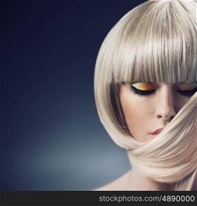 Portrait of a blond woman with trendy coiffure