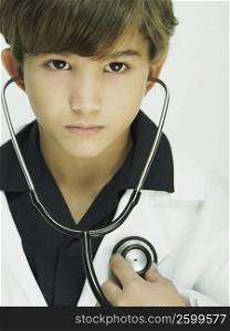 Portrait of a boy dressed as a doctor