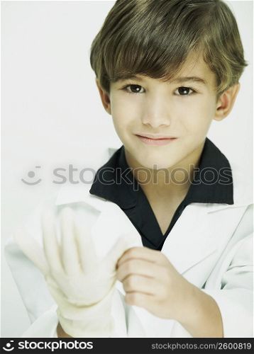 Portrait of a boy dressed as a doctor