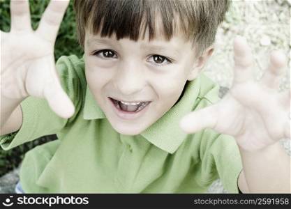 Portrait of a boy gesturing