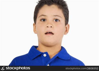Portrait of a boy looking surprised