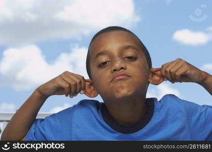 Portrait of a boy making a face