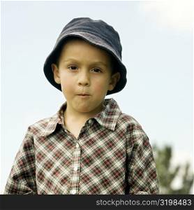Portrait of a boy wearing a hat