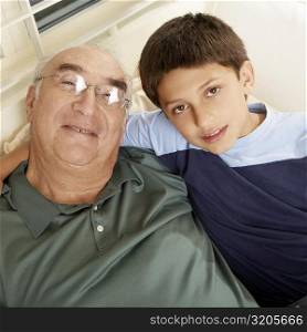 Portrait of a boy with his grandfather