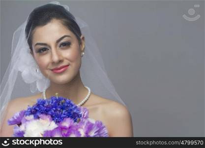 Portrait of a bride with flowers