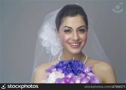 Portrait of a bride with flowers