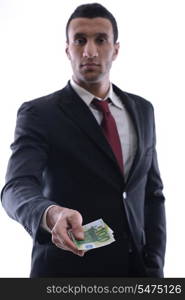 Portrait of a business man holding and catch falling money bills, isolated on white background in studio