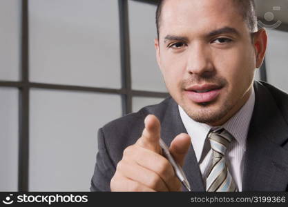 Portrait of a businessman gesturing