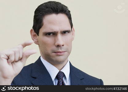 Portrait of a businessman gesturing