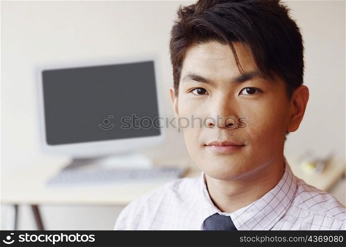 Portrait of a businessman in an office