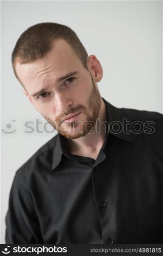 Portrait of a businessman looking at camera, natural light
