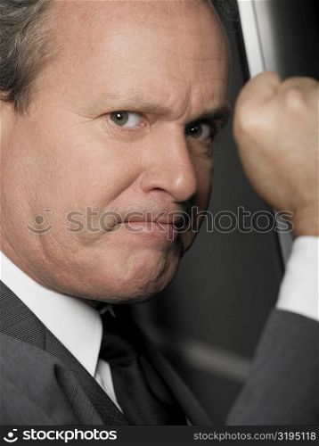 Portrait of a businessman looking furious