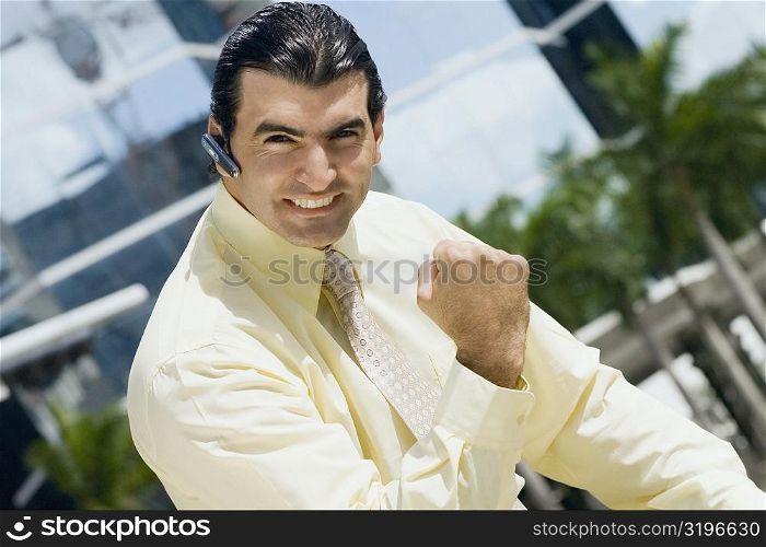 Portrait of a businessman making a fist and looking excited