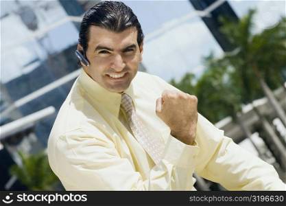 Portrait of a businessman making a fist and looking excited