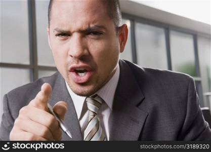 Portrait of a businessman shouting