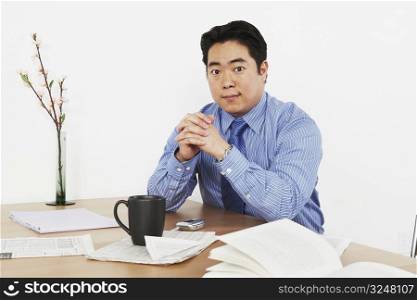 Portrait of a businessman sitting