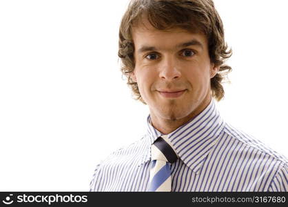 Portrait of a businessman smiling with a teenage girl and business executives standing in the background