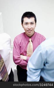 Portrait of a businessman smiling with his arms crossed