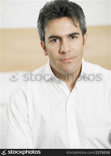 Portrait of a businessman smirking