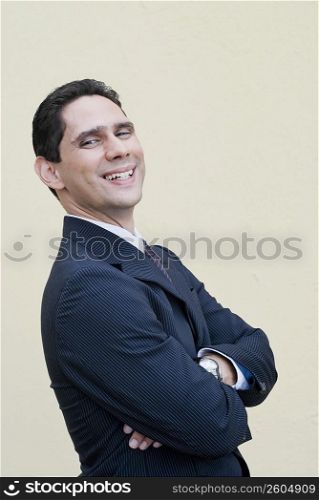 Portrait of a businessman standing with his arms crossed