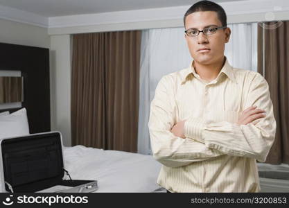 Portrait of a businessman standing with his arms crossed