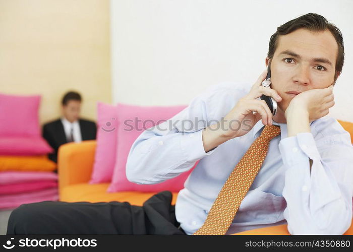 Portrait of a businessman talking on a mobile phone