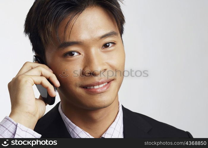 Portrait of a businessman talking on a mobile phone